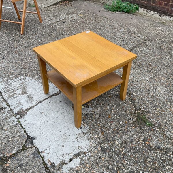 Vintage oak square coffee table with lower shelf.