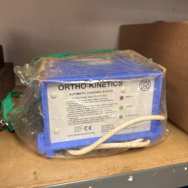 Vintage Ortho Kinetics automatic charging system side view.