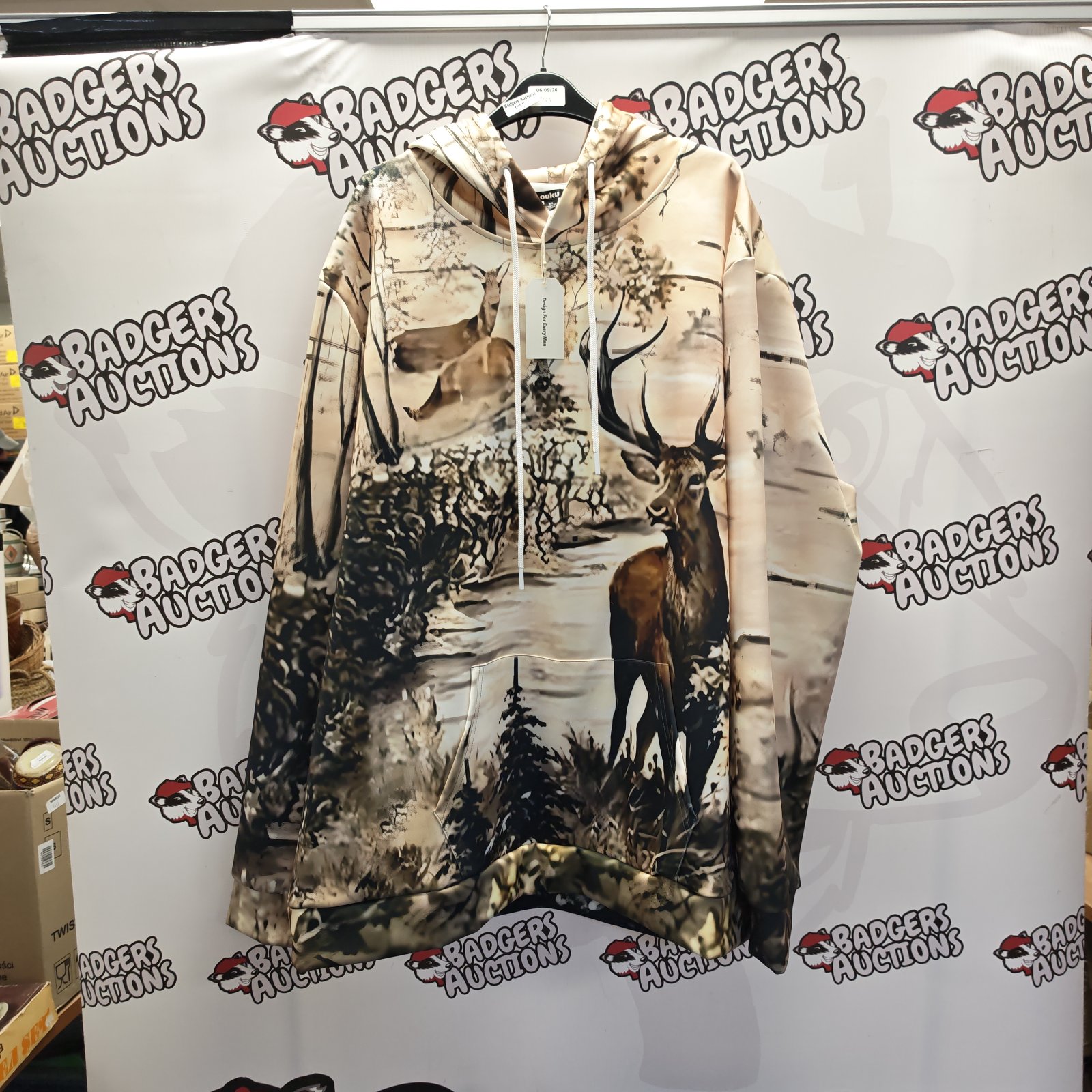 Size 4XL Ouku Design hunting hoodie with camouflage stag graphic.