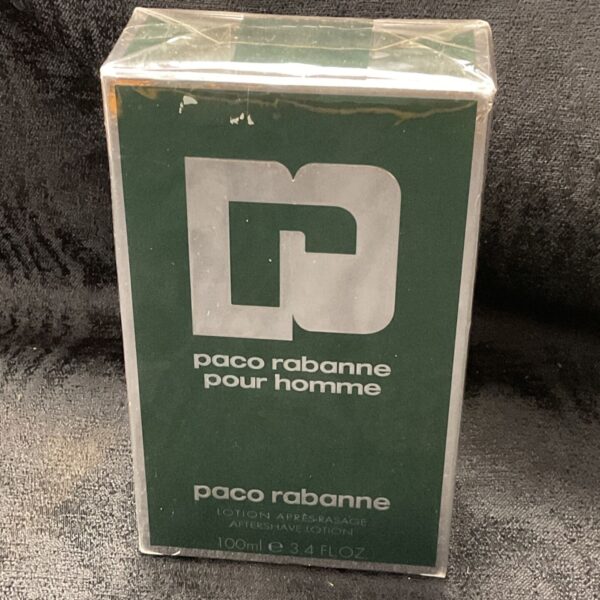Sealed bottle of Paco Rabanne aftershave, vintage men's fragrance.