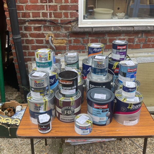 Large collection of interior paint tins including Farrow & Ball and Dulux.