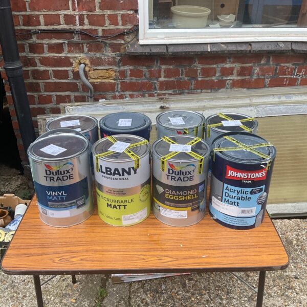 Collection of eight paint tins including Dulux and Johnstone's.