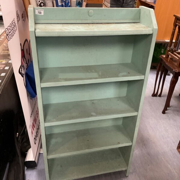 Vintage painted wooden bookshelf with three tiers for storage.