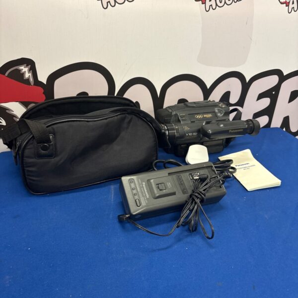 Vintage Panasonic Concorda S7B camcorder in its case with recharger.