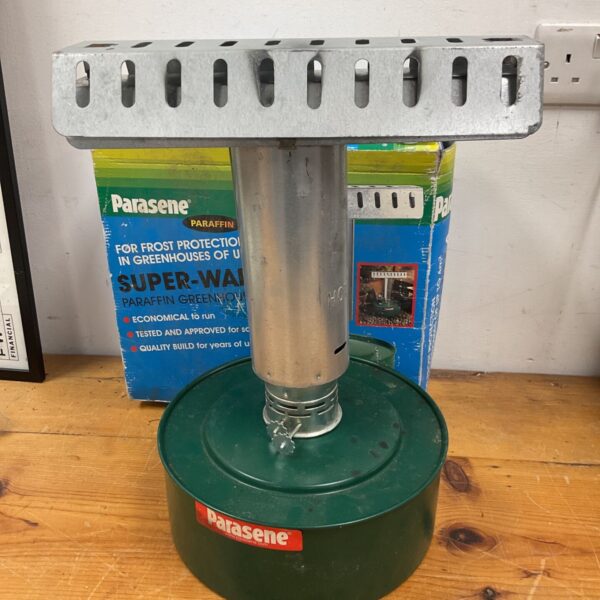 Vintage Parasene greenhouse heater for garden use.