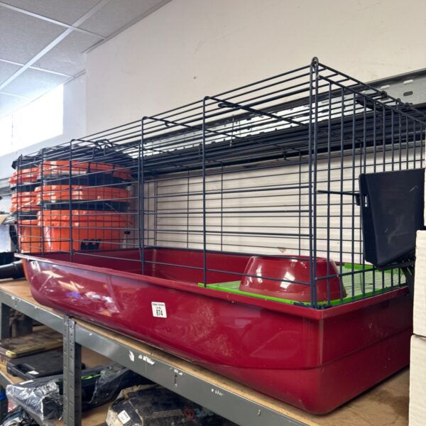 Wire frame pet hutch for small animals, approximately 39 inches long.