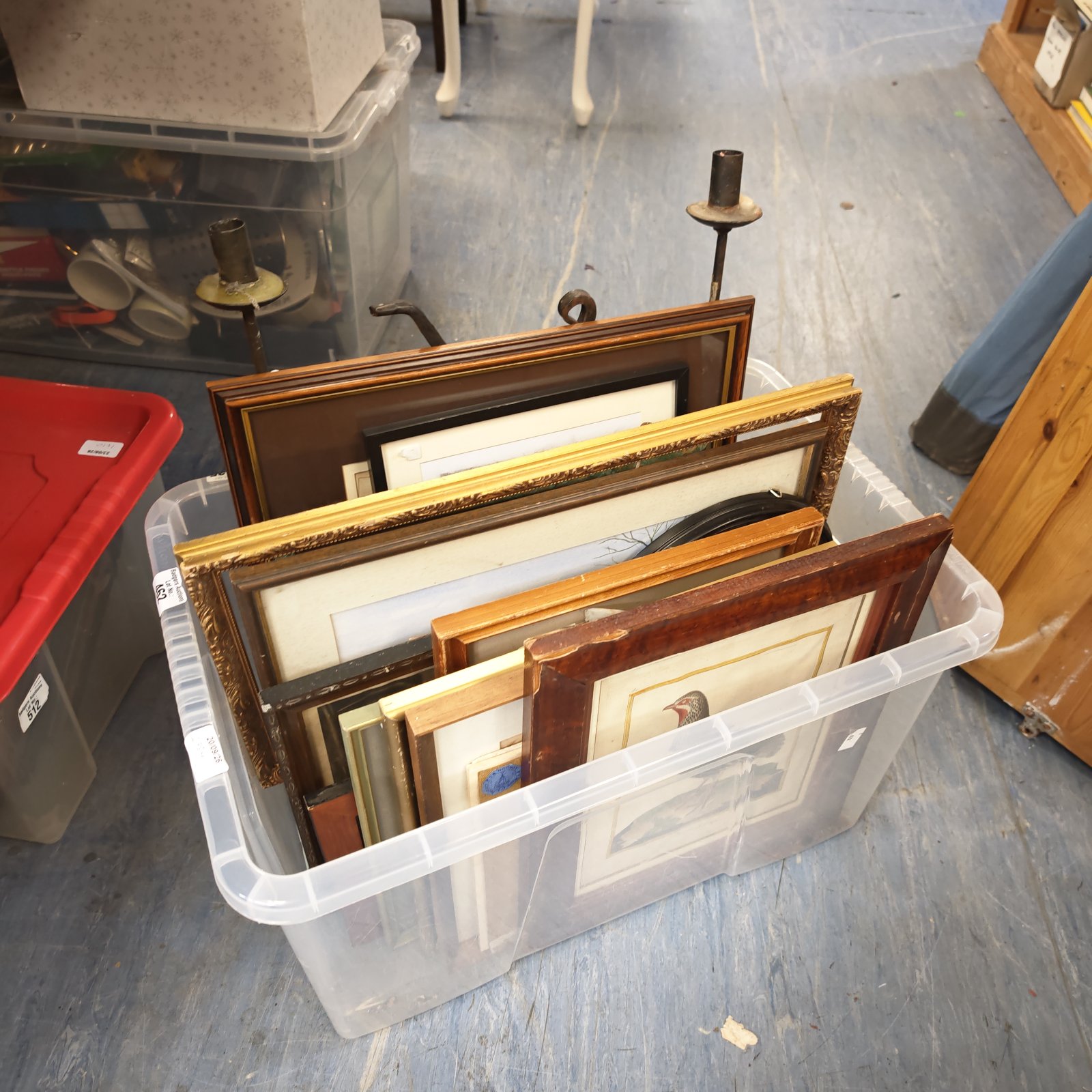 Mixed lot of vintage picture frames and candlesticks for home decor.