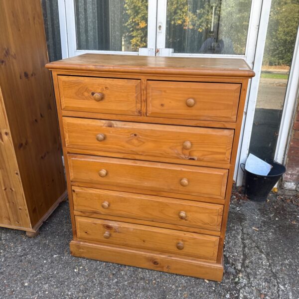 Vintage pine chest of drawers with two over four drawer configuration.
