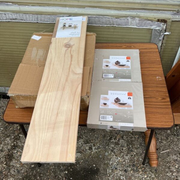 New pine floating shelf kit in original packaging.