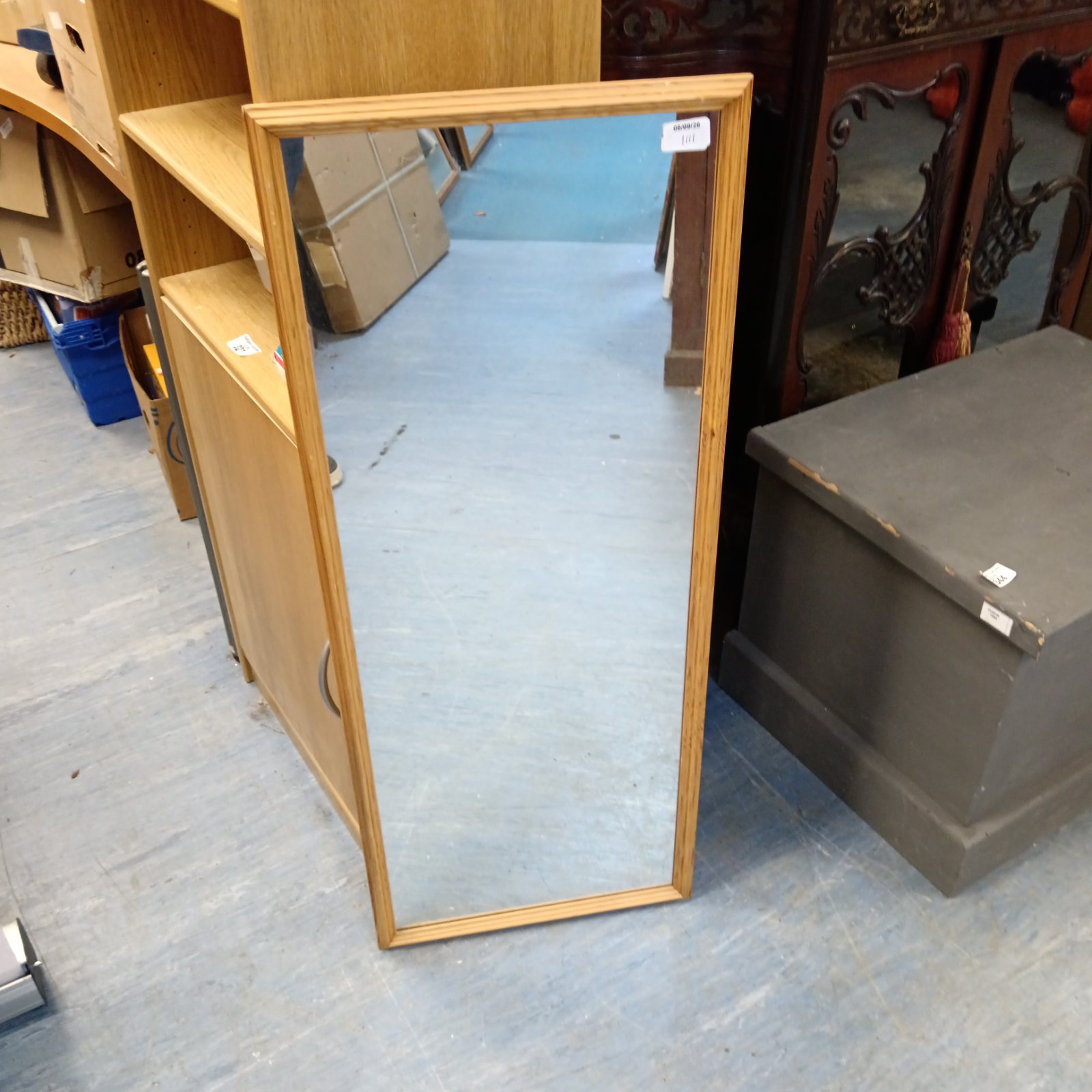 Vintage pine framed mirror measuring 97cm x 39cm.