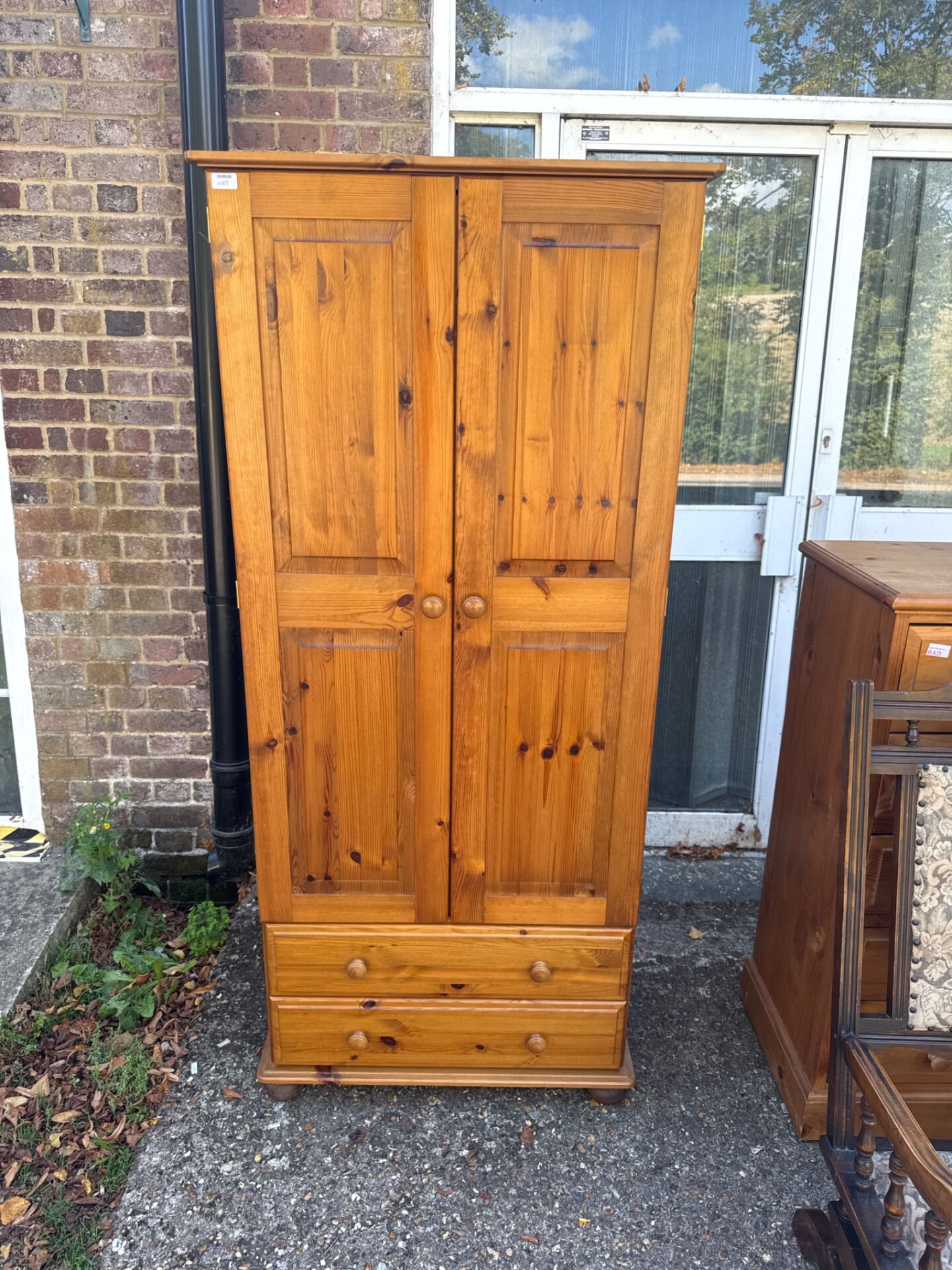 572 Pine slimline wardrobe with two drawers 32” width x 21” depth x 76” height at furthest points