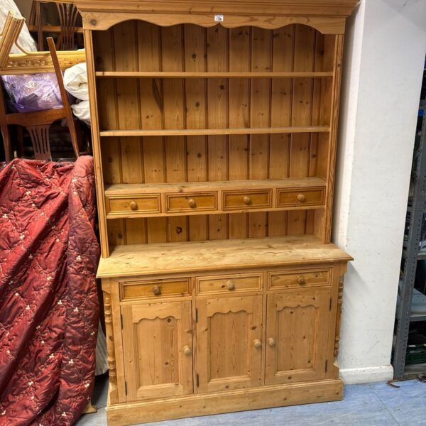 Large pine Welsh dresser with display shelves and storage.