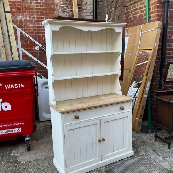 Cream painted pine Welsh dresser with plate rack.