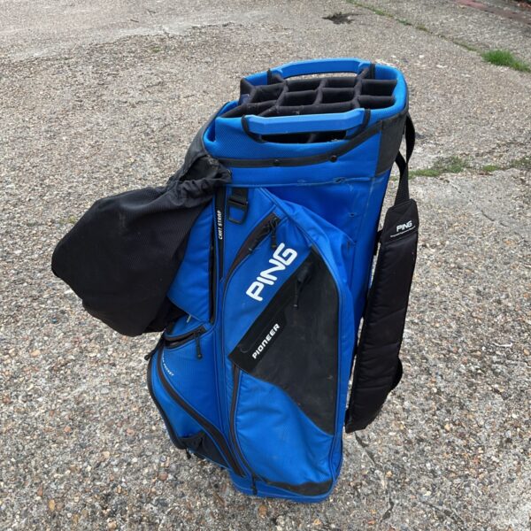Blue Ping Pioneer golf bag with carry straps.