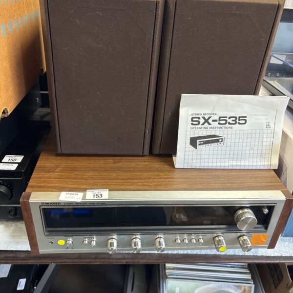 Vintage Pioneer SX-535 stereo receiver with speakers, classic audio.