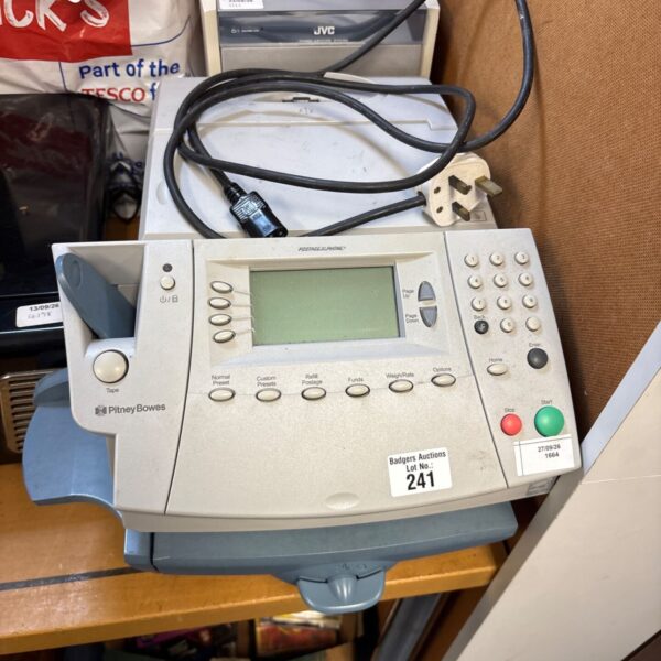 Pitney Bowes DM300c mailing system, a used franking machine.