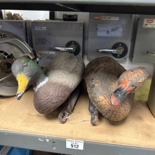 Two vintage plastic decoy ducks for hunting or collecting.