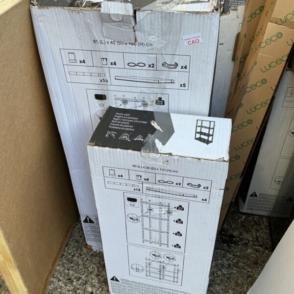 Stacked plastic shelving sets ready for storage or organization.