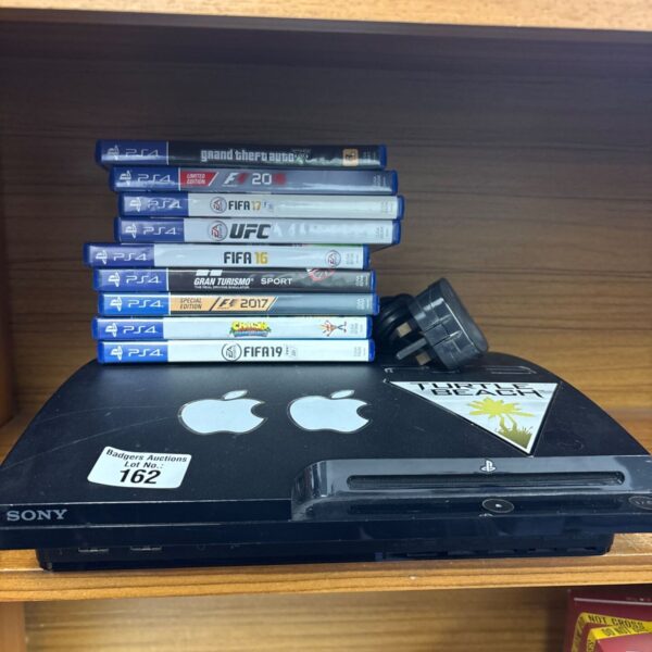 PlayStation 3 Slim console with included PlayStation 4 games.