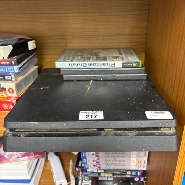 Sony PlayStation 4 console with games displayed for auction.