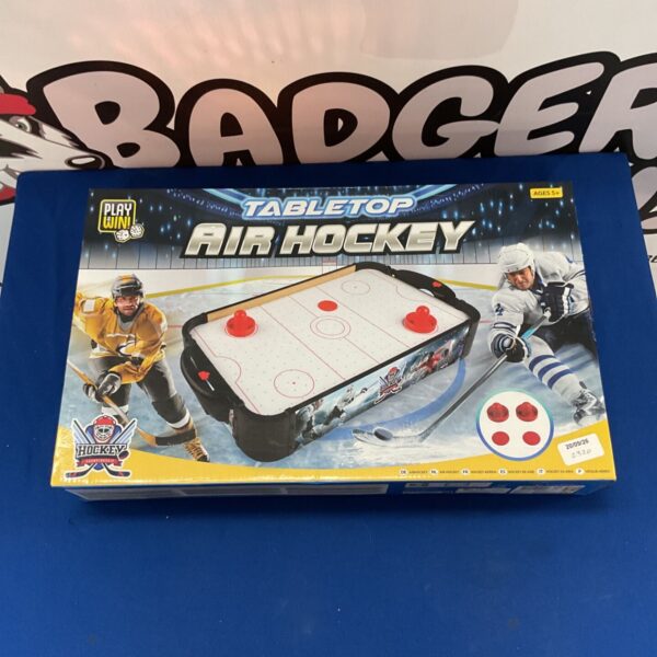 Playwin tabletop air hockey game in vintage condition.