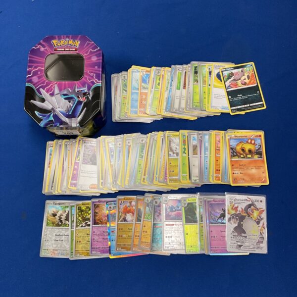 Pokemon card bundle with tin and holographic cards for collectors.