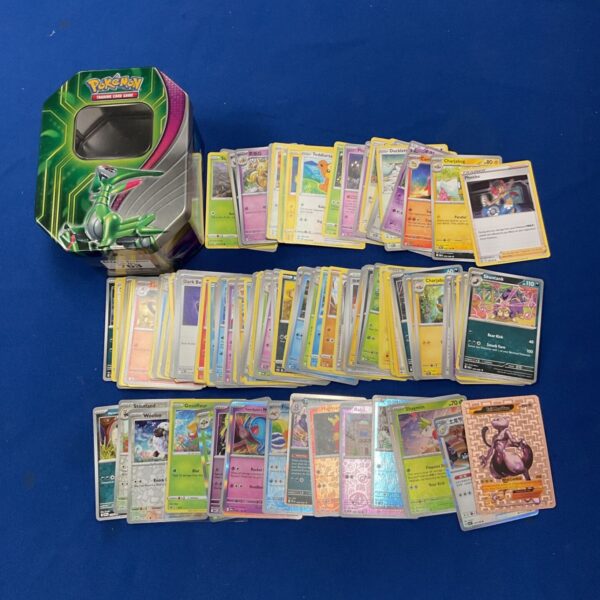 Pokemon card bundle with tin and holographic cards for collectors.