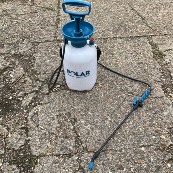 Blue Polar garden sprayer for plant care and garden maintenance.