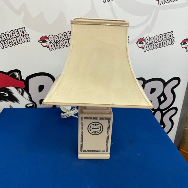 Vintage porcelain table lamp with a creamy white finish.