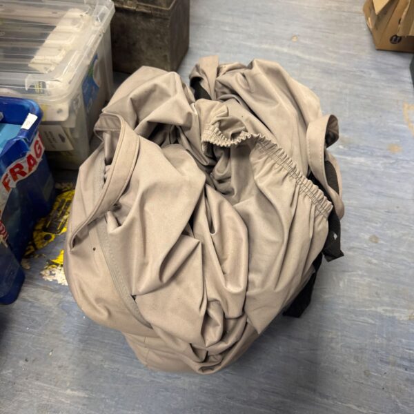 Grey Porsche indoor car cover for vehicle protection.
