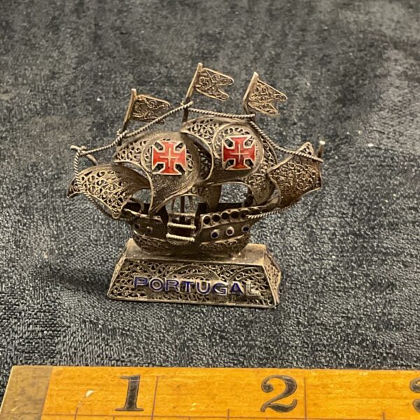 Vintage Portuguese filigree galleon with red enamel crosses.