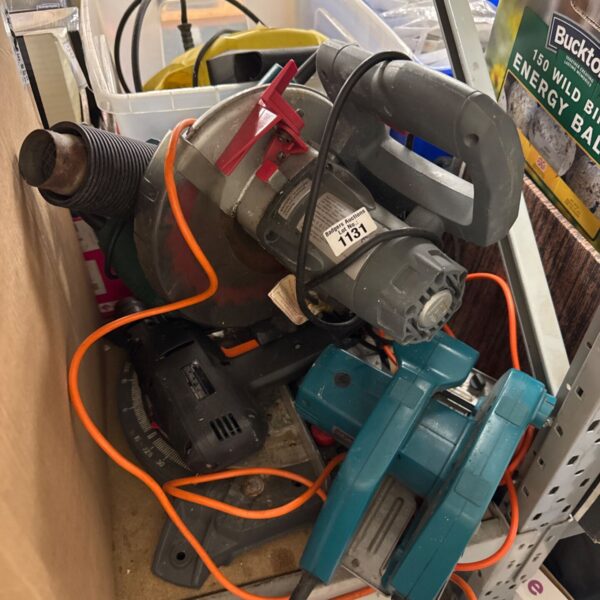Power tool bundle including Black & Decker circular saw and chop saw.