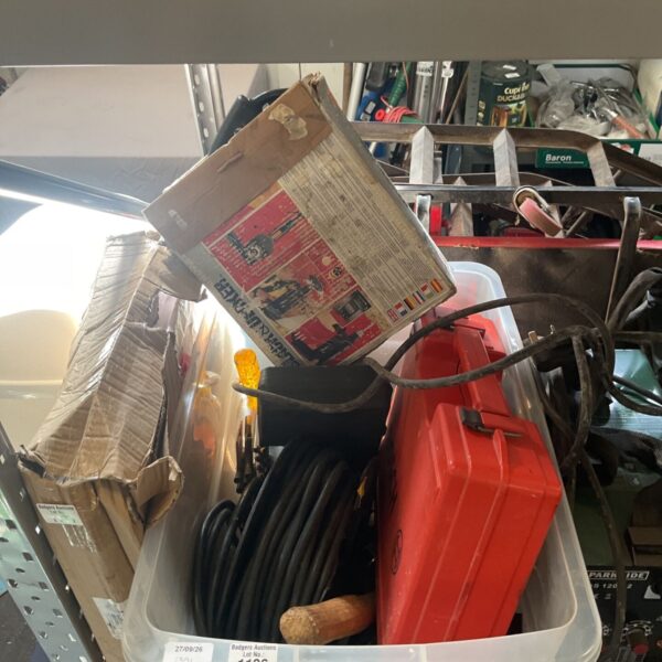 Power tool lot featuring Bosch jigsaw and Black and Decker hammer drill.