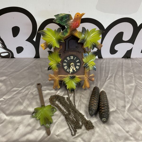 Vintage Presta West German cuckoo clock with weights and pendulum.