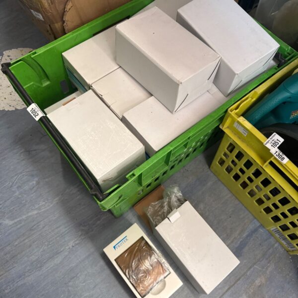 Quantity of Protek 4 module incomer units in green storage crates.