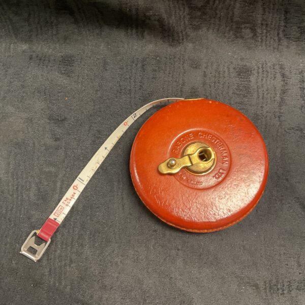 Vintage Rabone Chesterman leather tape measure for surveying.