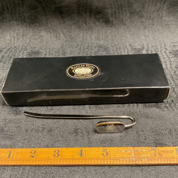 Vintage Raffles Hotel Singapore silver plate bookmark.
