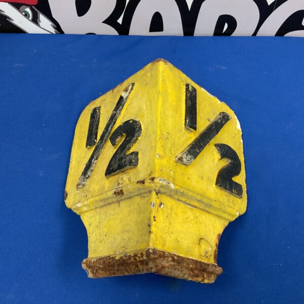Vintage cast iron railway train marker displaying "1/2" from Wendover Station.