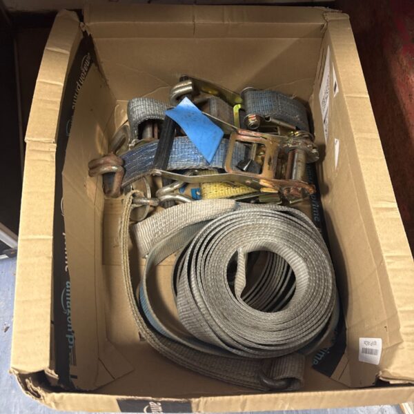 Lot of heavy duty ratchet straps for securing cargo.