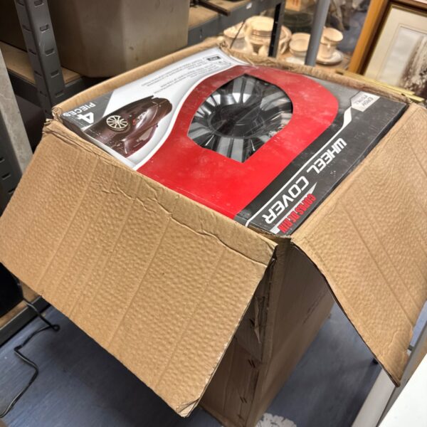 Wholesale box of new red and black 15 inch wheel trims.