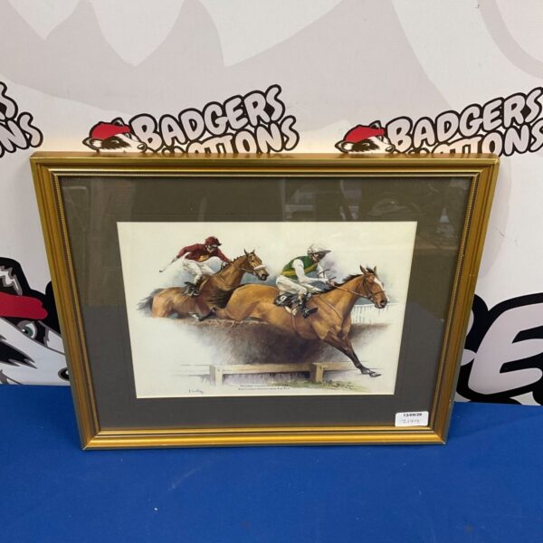 Framed limited edition print of Red Rum racehorse in action.