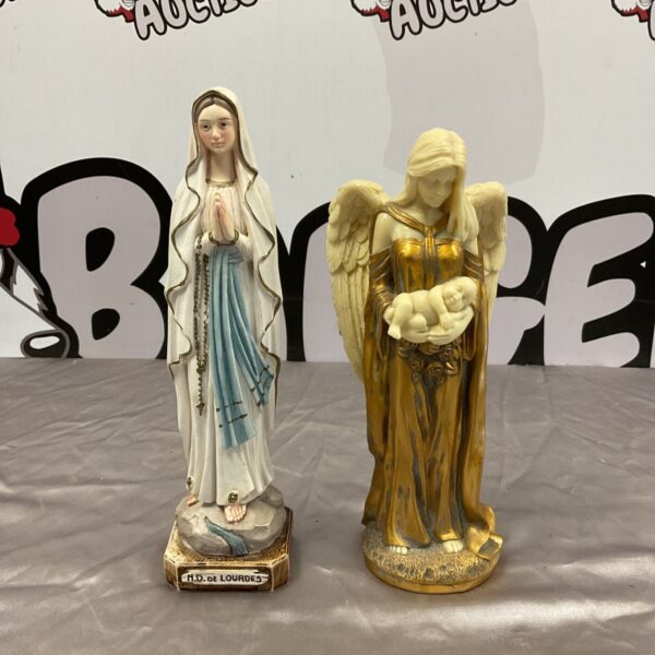 Religious resin figurines of Mary and angel with child for collectors.