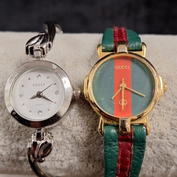 Silver-toned replica Gucci quartz ladies wristwatch.