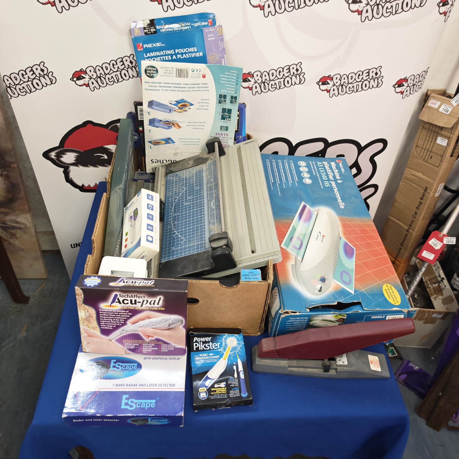 Rexel laminating machine with house clearance items.