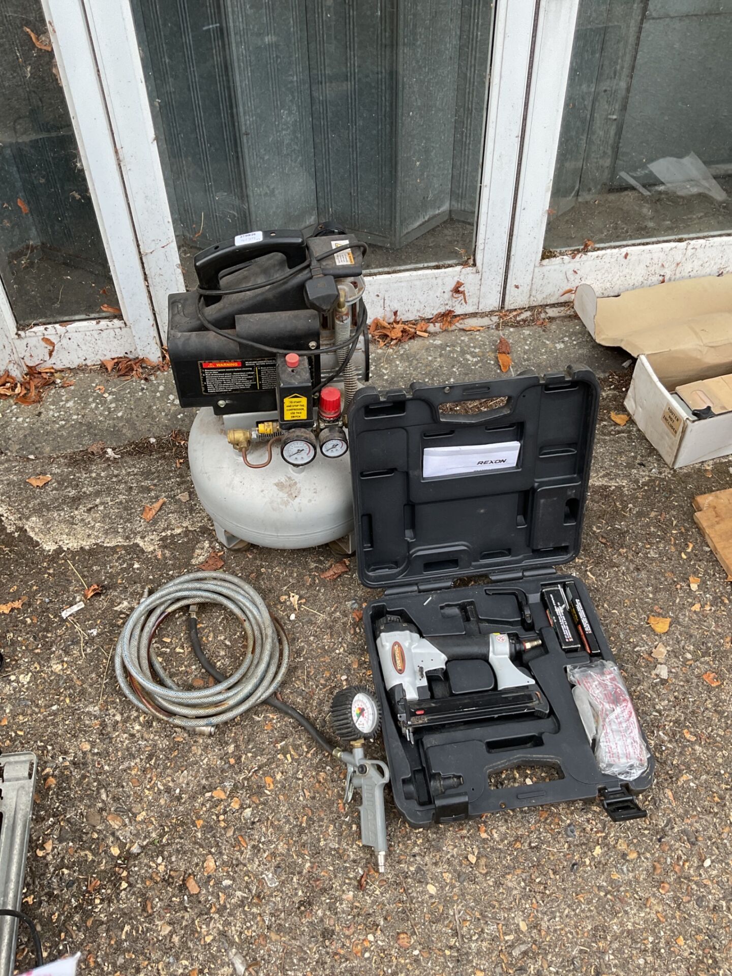 1213 Rexon air compressor with tradesman air nailer working