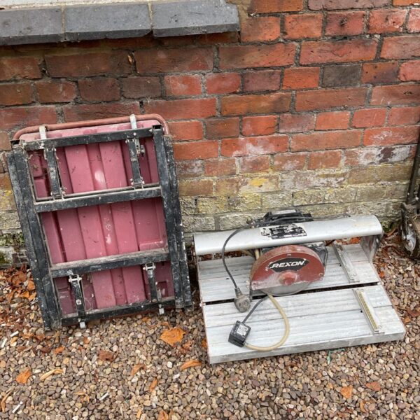 Rexon RTC200A tile cutter showing signs of wear.