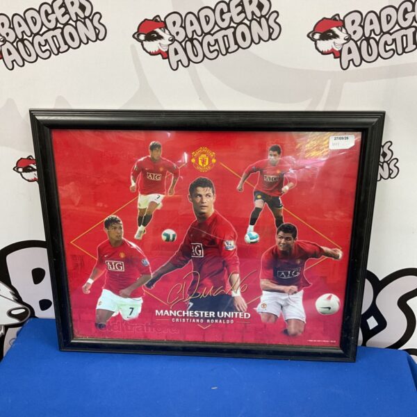 Framed Ronaldo Manchester United print for football fans.
