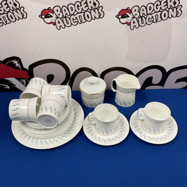 Royal Stafford Demure tea set with floral pattern on display.