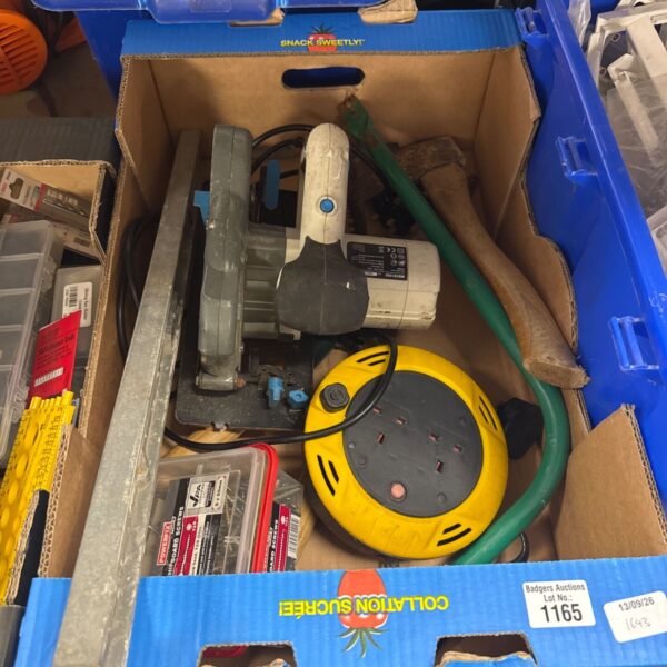 Yellow and black Ryobi circular saw from a shed clearance lot.