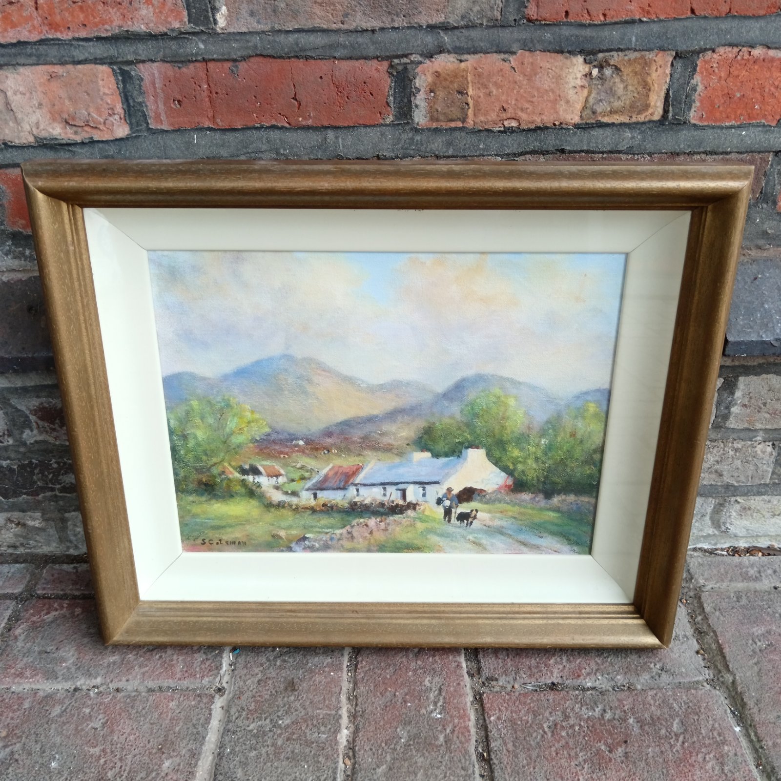 S Coleman Scottish Highland oil painting with cottage and figure.